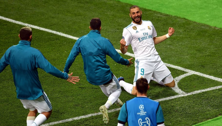 KIEV, UKRAINE - MAY 26:  Karim Benzema of Real Madrid celebrates scoring his side's first goal with team mates during the UEFA Champions League Final between Real Madrid and Liverpool at NSC Olimpiyskiy Stadium on May 26, 2018 in Kiev, Ukraine.  (Photo by Mike Hewitt/Getty Images)