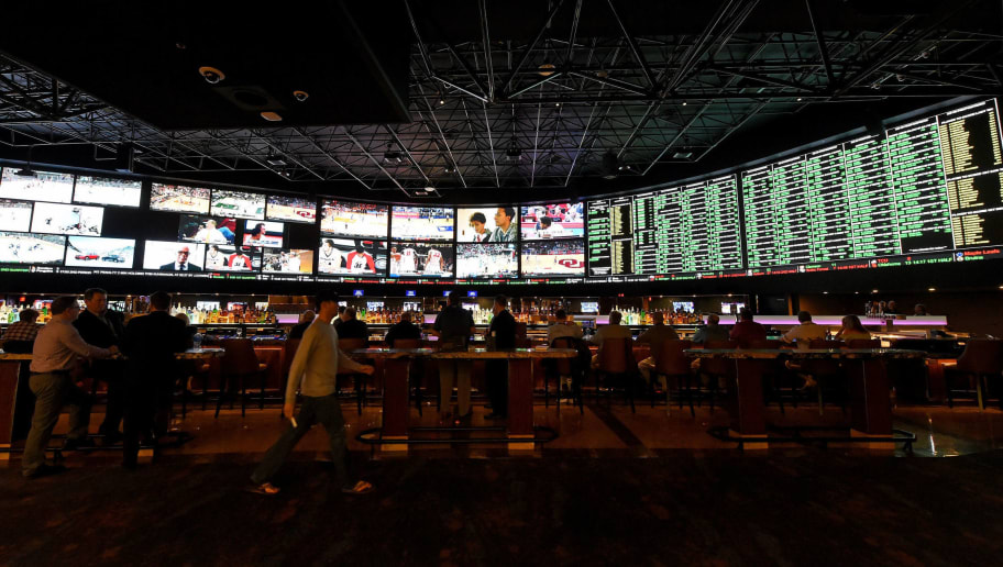 LAS VEGAS, NV - FEBRUARY 02:  The betting line and some of the nearly 400 proposition bets for Super Bowl 50 between the Carolina Panthers and the Denver Broncos are displayed at the Race & Sports SuperBook at the Westgate Las Vegas Resort & Casino on February 2, 2016 in Las Vegas, Nevada. The newly renovated sports book has the world's largest indoor LED video wall with 4,488 square feet of HD video screens measuring 240 feet wide and 20 feet tall.  (Photo by Ethan Miller/Getty Images)