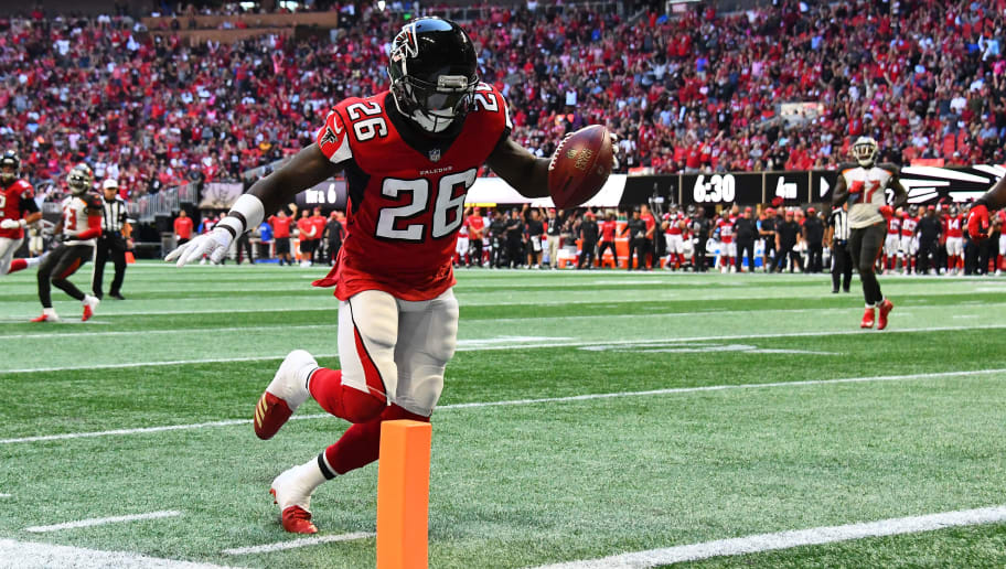 ATLANTA, GA - OCTOBER 14: Tevin Coleman #26 of the Atlanta Falcons runs for a touchdown during the fourth quarter against the Tampa Bay Buccaneers at Mercedes-Benz Stadium on October 14, 2018 in Atlanta, Georgia. (Photo by Scott Cunningham/Getty Images)