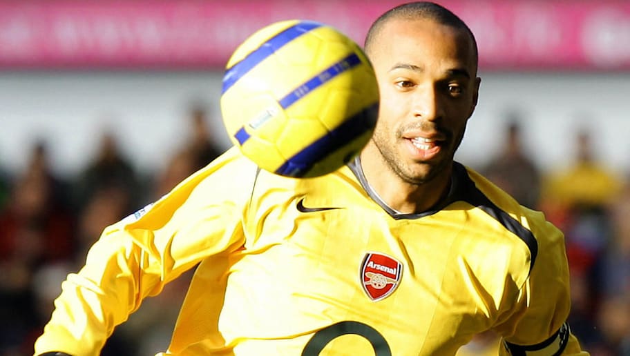 Thierry Henry of Arsenal chases the ball