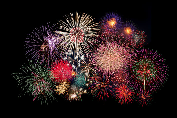 An assortment of colorful fireworks bursting in the sky