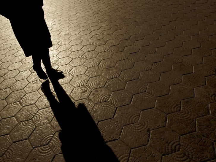 Silhouette of woman walking