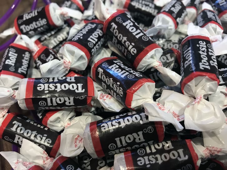A close-up view of a bunch of Tootsie Rolls.