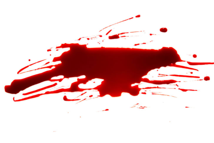 A smear of fake blood on a white background