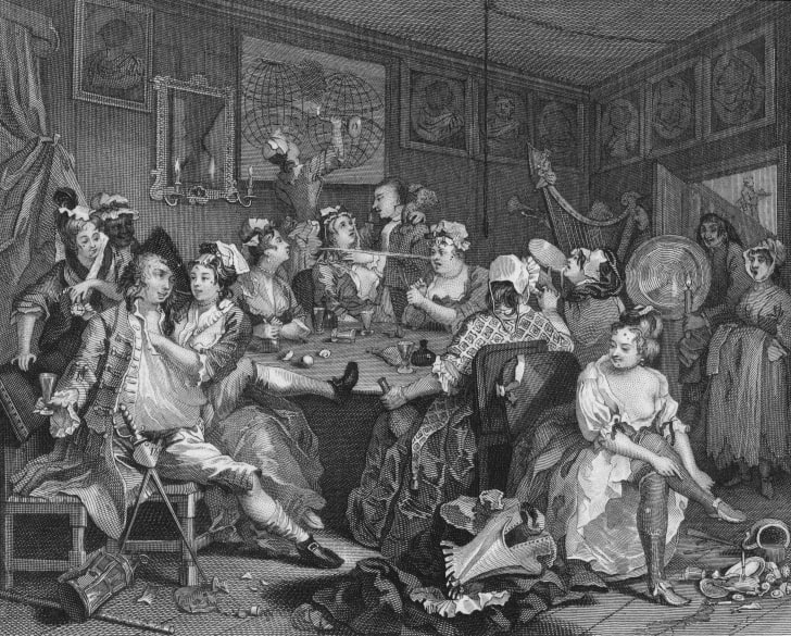 The Tavern Scene from Plate 3 of 'The Rake's Progress', a series of paintings by William Hogarth, circa 1735.