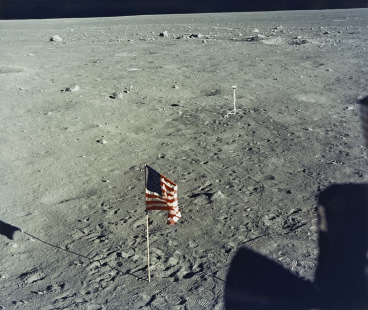 The United States flag is planted on the surface of the Moon by the astronauts of NASA's Apollo 11 lunar landing mission, as seen from inside the Lunar Module the 'Eagle', 20th July 1969