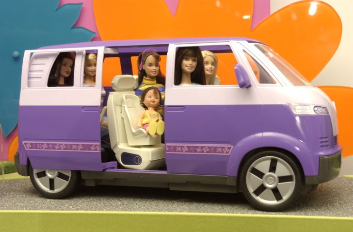 A Barbie van filled with dolls