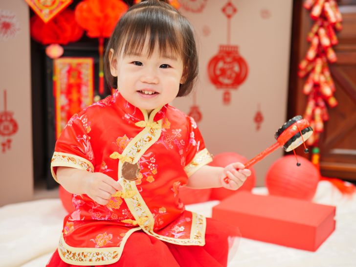 toddler dressed up for Chinese New Year