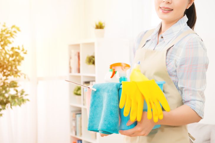 woman ready to clean a home
