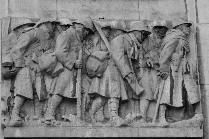 Soldiers carved into World War I memorial.