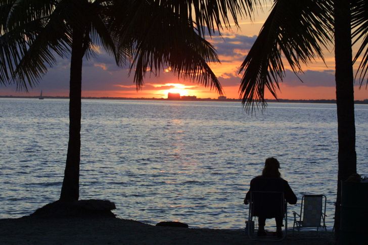 A man watching a sunset.
