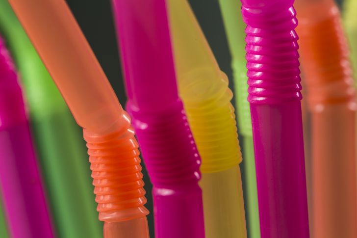 A close-up of colorful bendy straws.