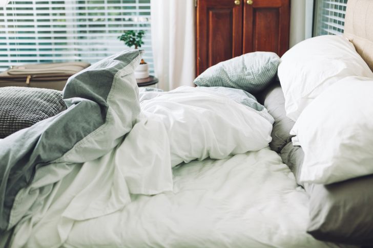 An unmade bed.