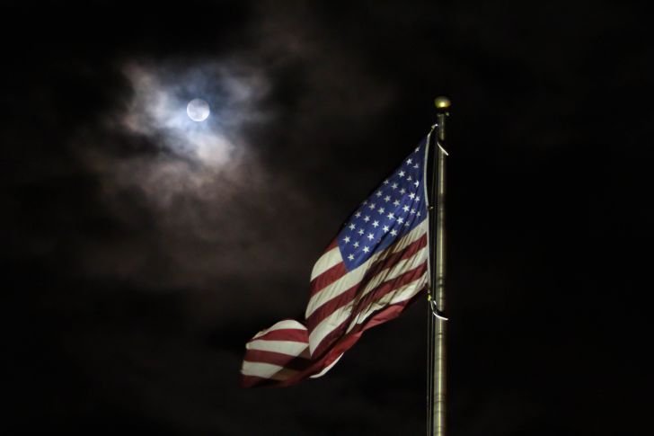 American flag at night
