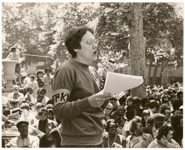 Barbara Gittings speaking at an event.