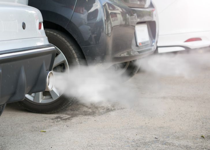 Car exhaust emitting smoke.