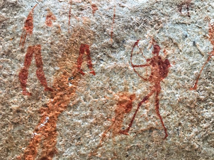 rock art of hunters using bows and arrows