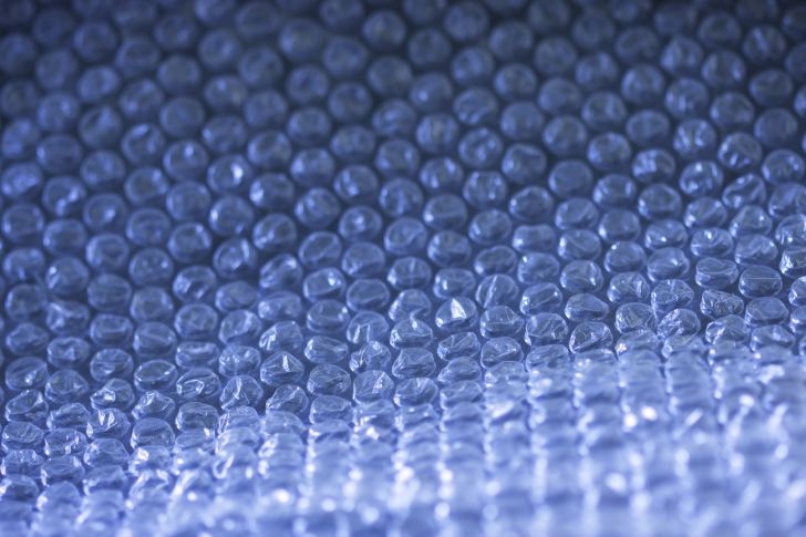 Bubble wrap with a blue tint.