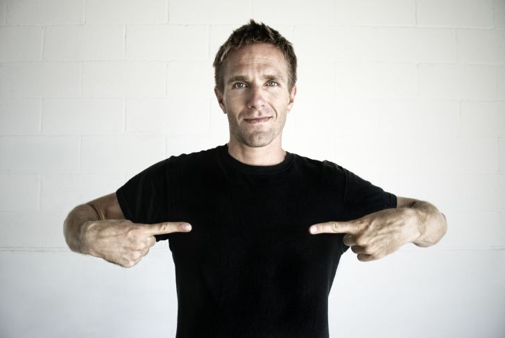 Man pointing to himself