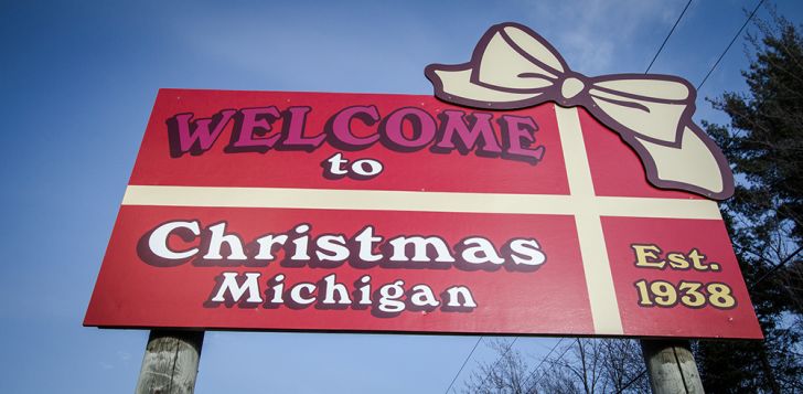 A sign reads ‘Welcome to Christmas, Michigan.’