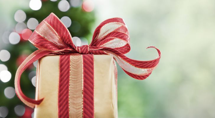 A present wrapped in a wide ribbon.