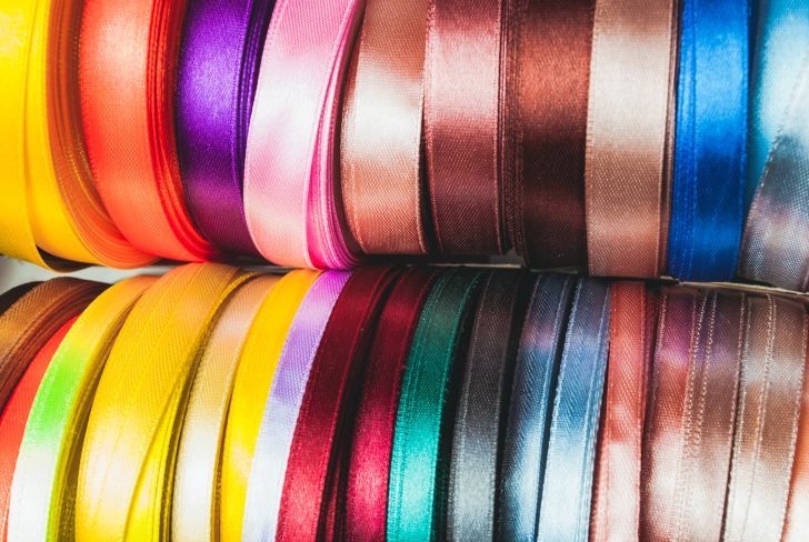 A close up of spools of ribbon.