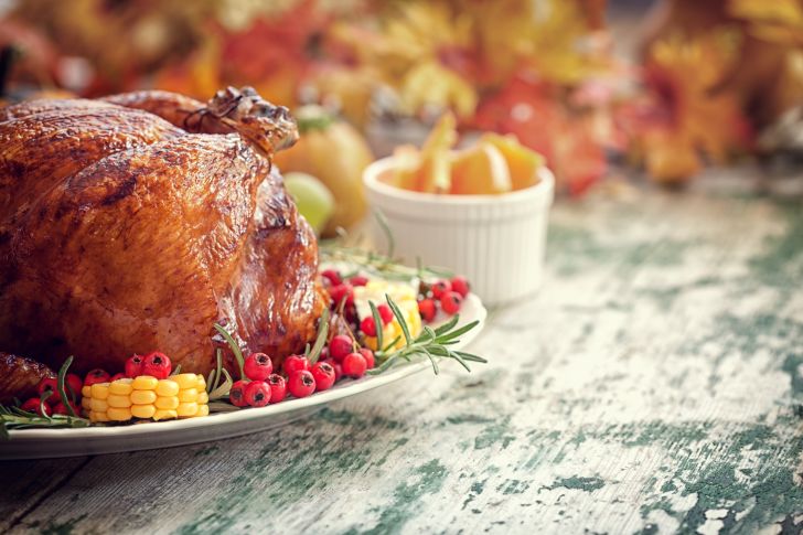 A roasted turkey on a platter.