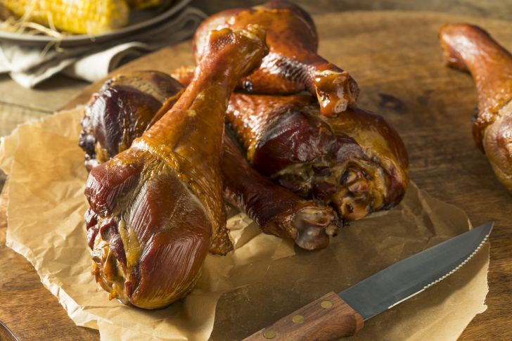 Roasted turkey legs on a piece of butcher paper