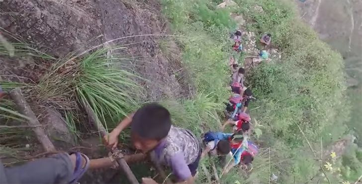 children climbing atuleer ladder