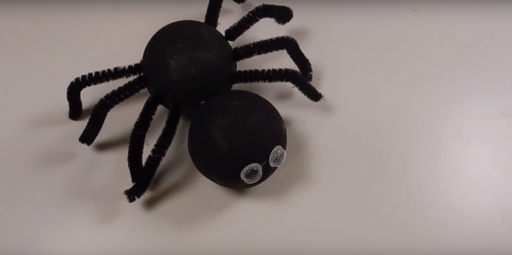 A foam spider with pipe cleaners for legs