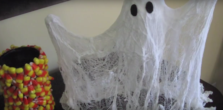 Cheesecloth is used to create a ghostly decoration