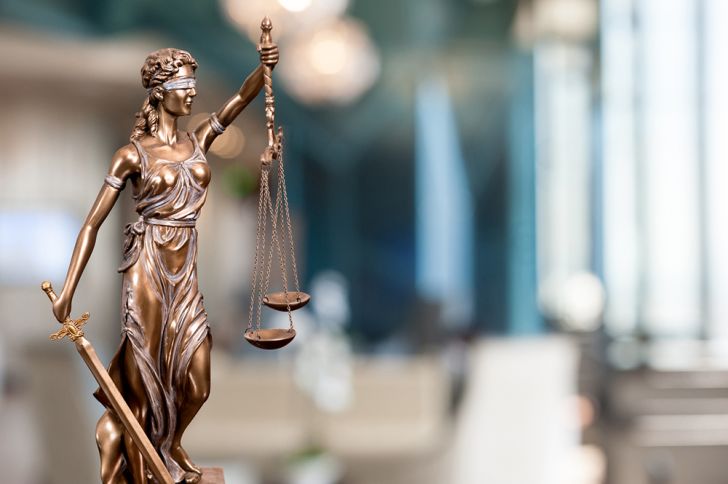 A statue of Lady Justice in an office