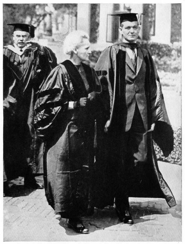 Marie Curie walking with Dean George B. Pegram of Columbia University. Marie Curie walking with Dean George B. Pegram of Columbia University.
