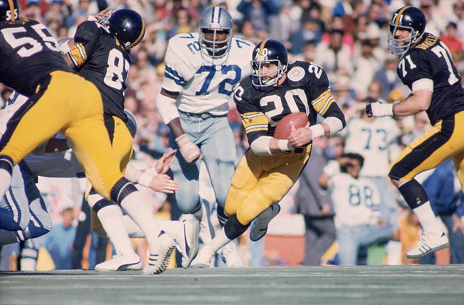 Rocky Bleier runs with the ball in Super Bowl X