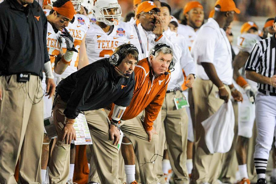 Texas Longhorns defensive coordinator Will Muschamp and head coach Mack Brown during the BCS national championship.