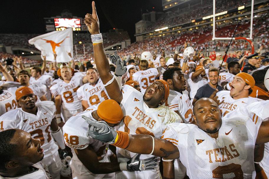 Texas quarterback Vince Young celebrates with teammates after beating Ohio State in 2005.
