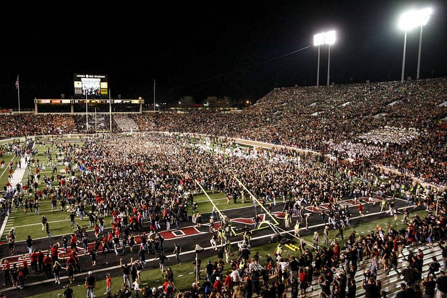 Texas Tech fans rush the field to celebrate after beating Texas in 2008.
