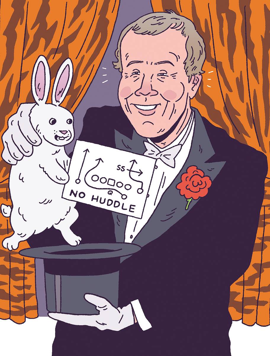 Sam Wyche dressed as a magician, pulling a rabbit out of a hat