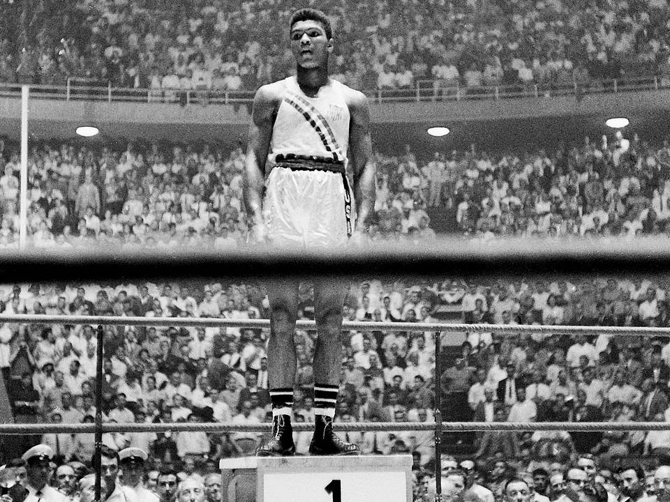 Cassius Clay on the podium at the 1960 Rome Olympics