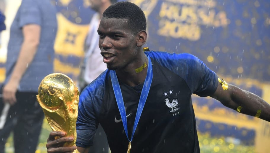 PHOTO: Man Utd Star Paul Pogba Dabs With World Cup Trophy 