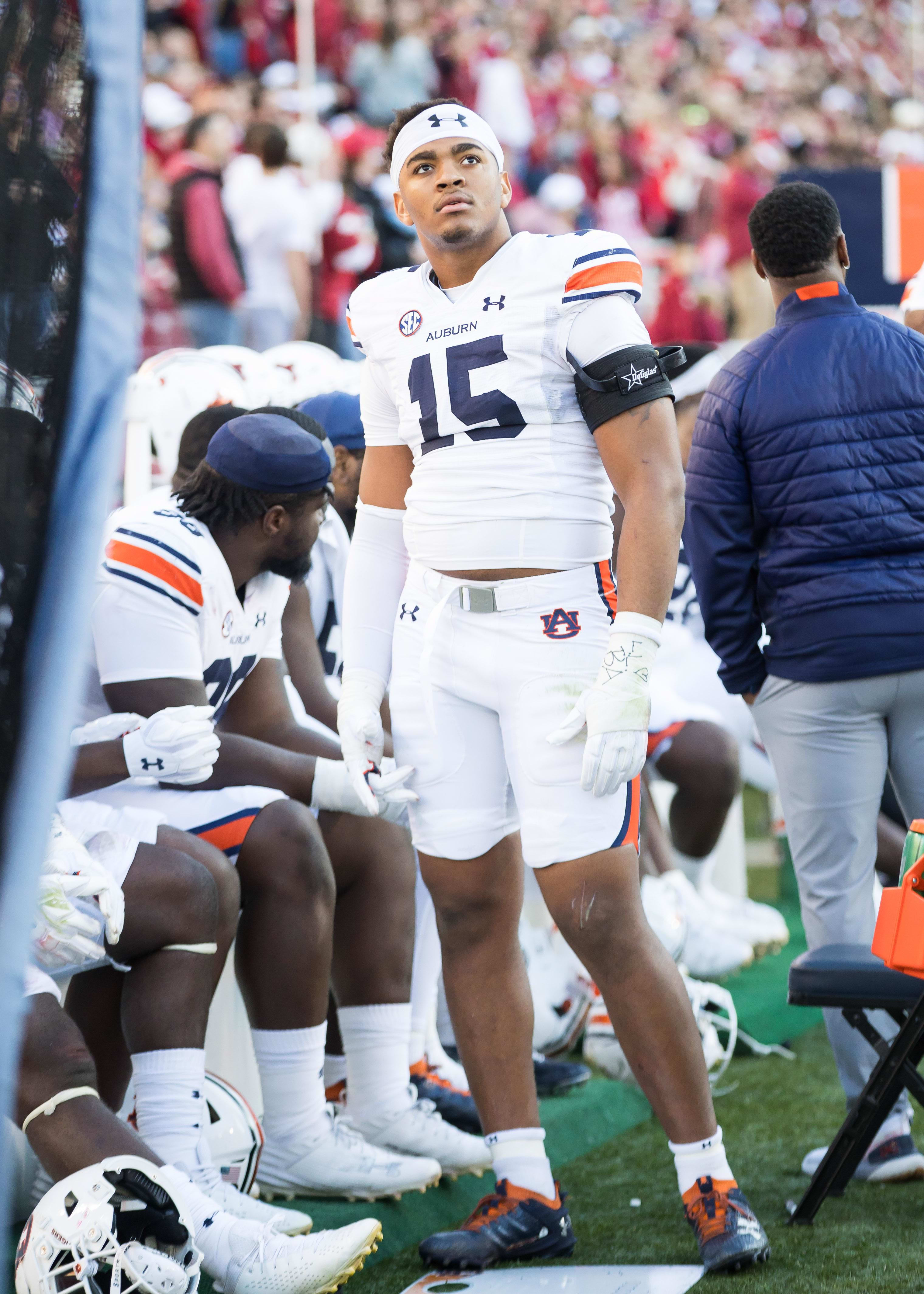 Auburn Tigers defensive lineman Keldric Faulk on the sidelines during the second quarter against the Arkansas Razorbacks.