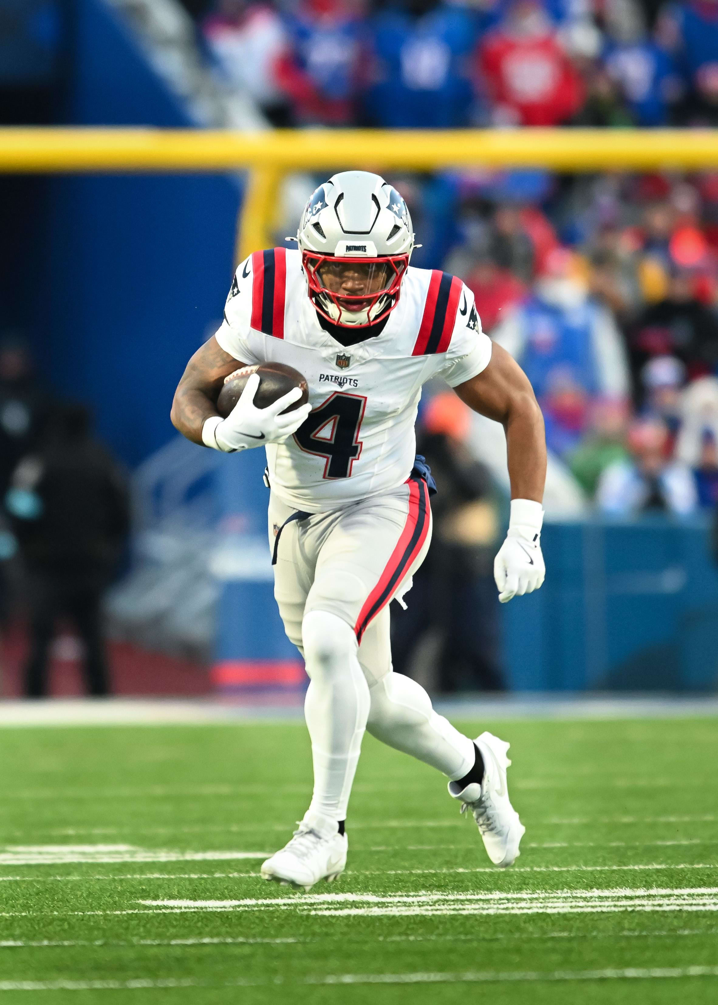 New England Patriots running back Antonio Gibson carries the ball against the Buffalo Bills.
