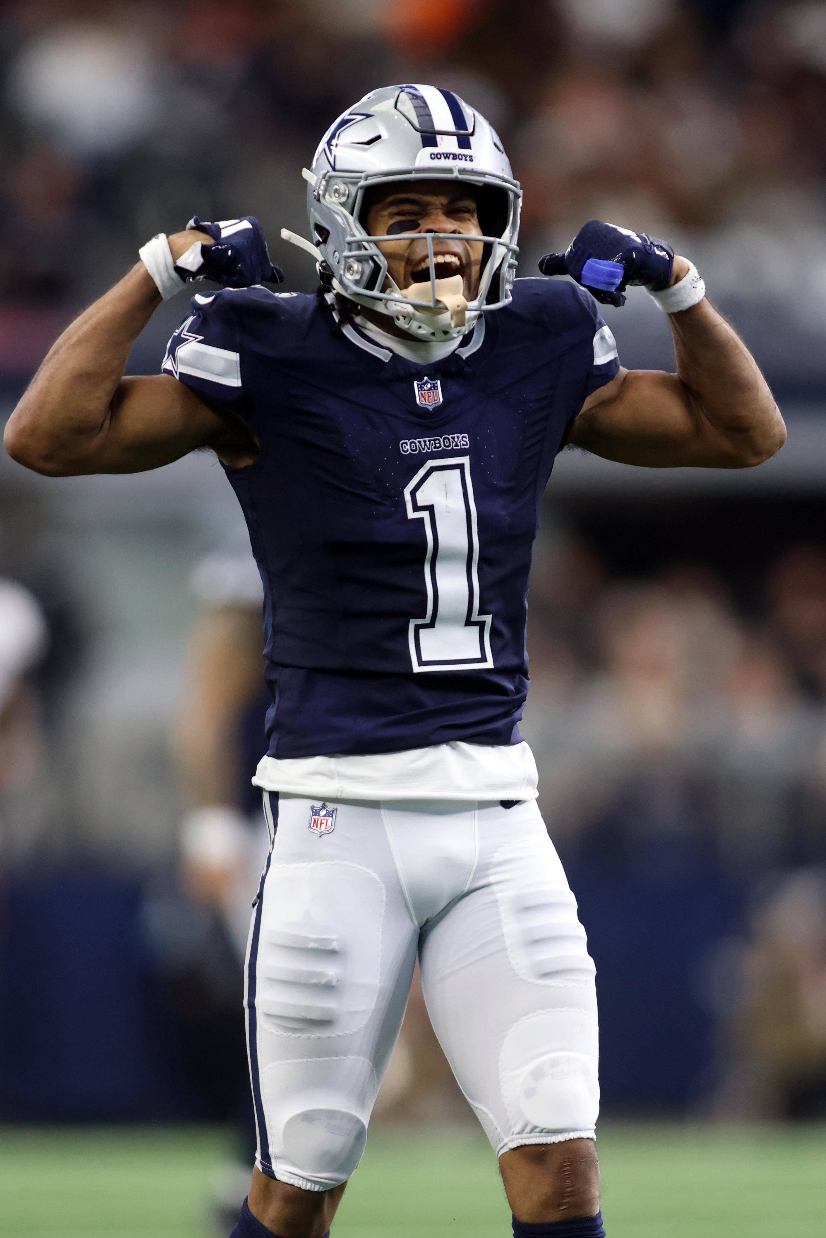Dallas Cowboys wide receiver Jalen Tolbert reacts after making a first down against the Washington Commanders 