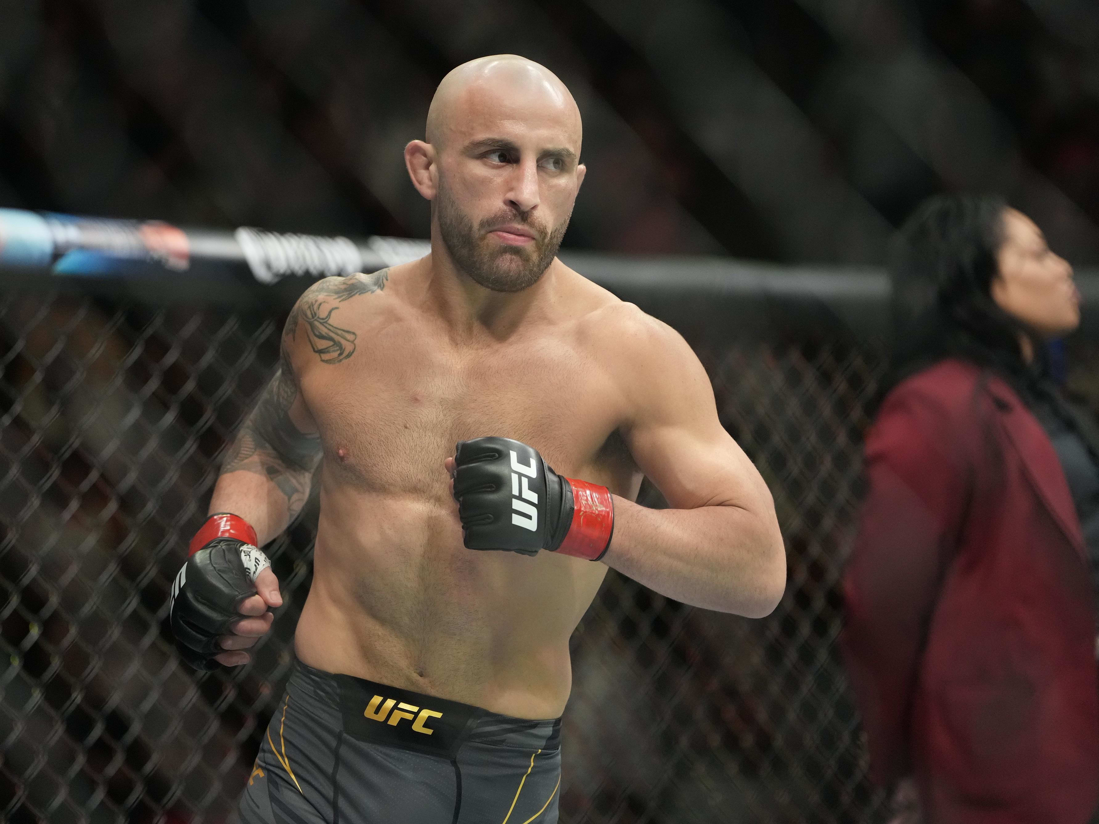 Alexander Volkanovski reacts before a bout against Max Holloway during UFC 276 at T-Mobile Arena. 