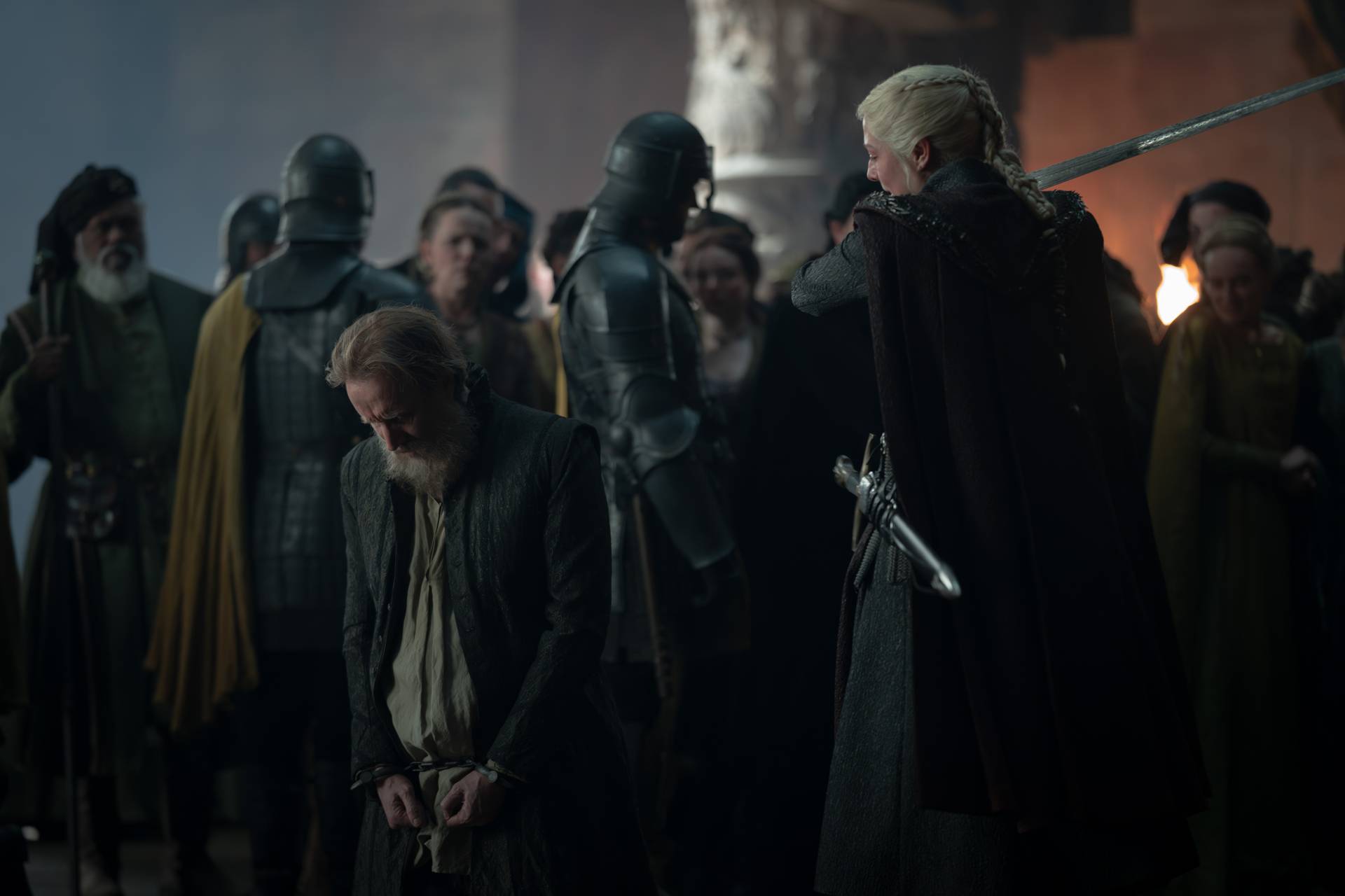 Rhys Ifans (Otto Hightower) and Emma D'Arcy (Rhaenyra Targaryen) in House of the Dragon season 3.