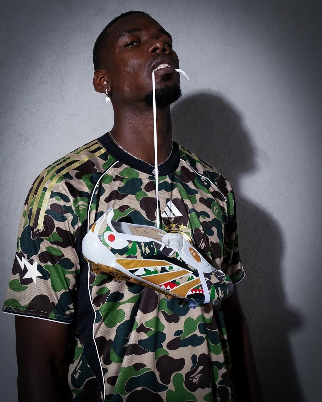 Paul Pogba styles adidas and BAPE's new collection.