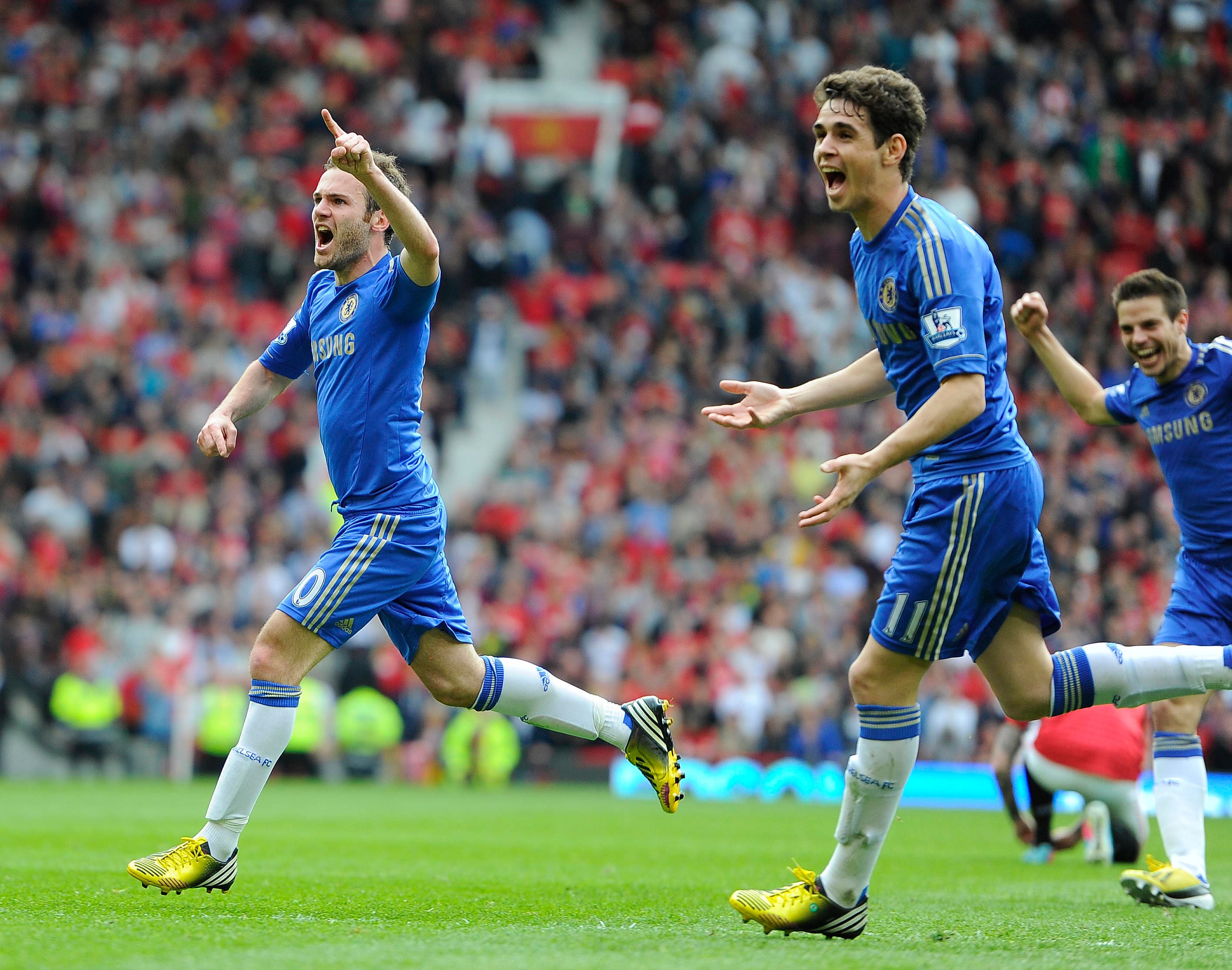Mata (left) celebrating Chelsea's winner in May 2013, the club's last Premier League win at Old Trafford.