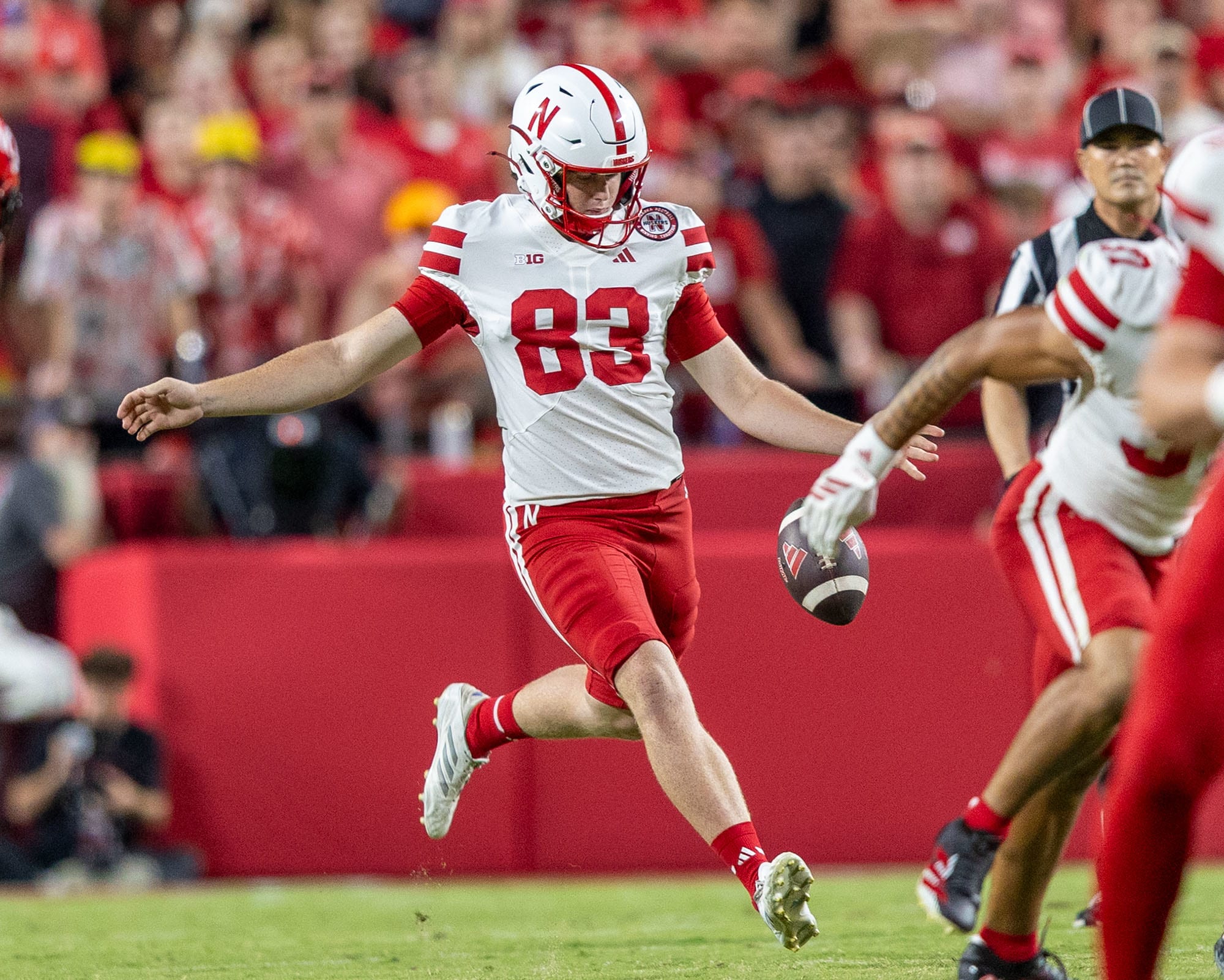 Nebraska's Archie Wilson prepares to punt the ball 41 yards during the third quarter against Cincinnati on Aug. 28, 2025
