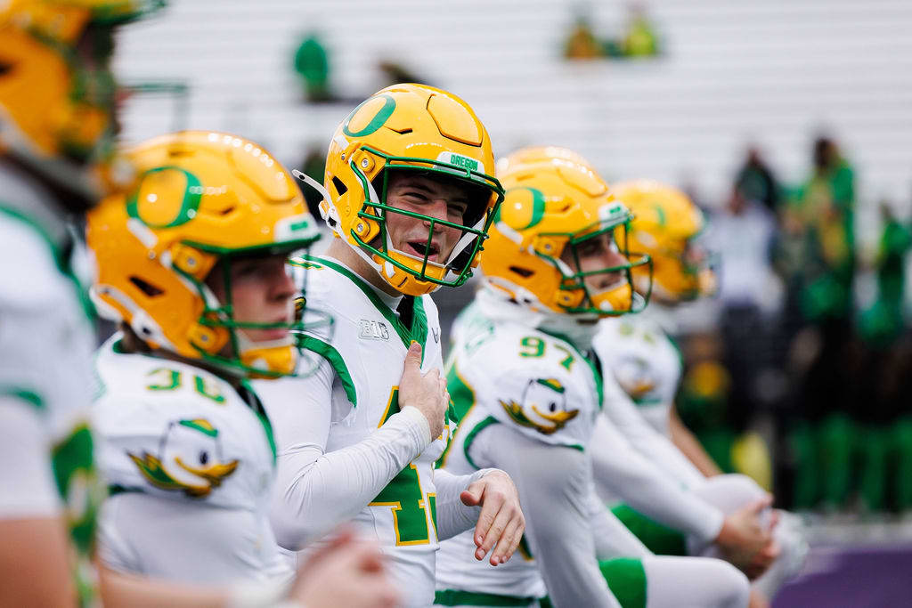 Oregon Ducks Washington Huskies uniforms nike phil knight husky stadium dan lanning NIL jedd fisch akili smith rivalry colleg