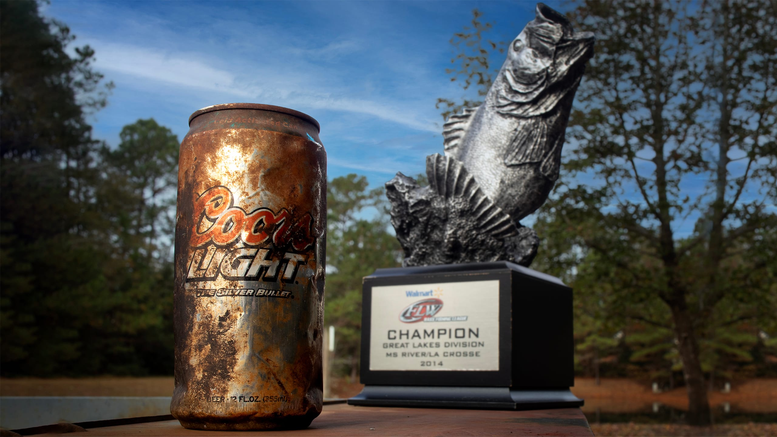 A unique keepsake: The tournament trophy paired with the old Coors Light can, a symbol of karma at work during the author’s m